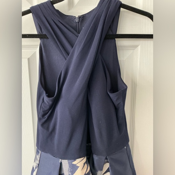 Elegant Navy Cross-Back Top with Floral Skirt - Picture 6 of 13